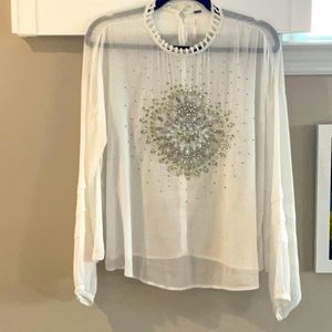Free People amazing stone studded blouse. This piece is a wonderful treasure.